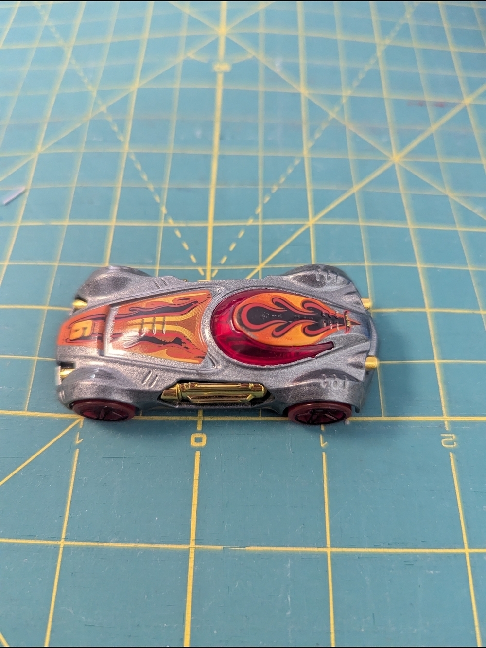2012 Mattel Die-Cast  Kids Toy Car with Red and Orange Flame Design